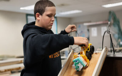 Students design & test car crumble zones in science lab