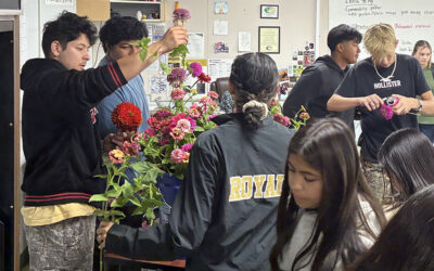 Floriculture students apply floral arrangement skills in class
