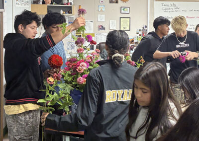 Floriculture students apply floral arrangement skills in class